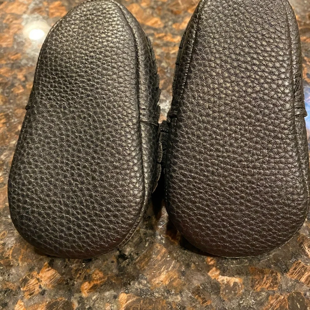 Baby Girl moccasins. Brand new ! Size 12